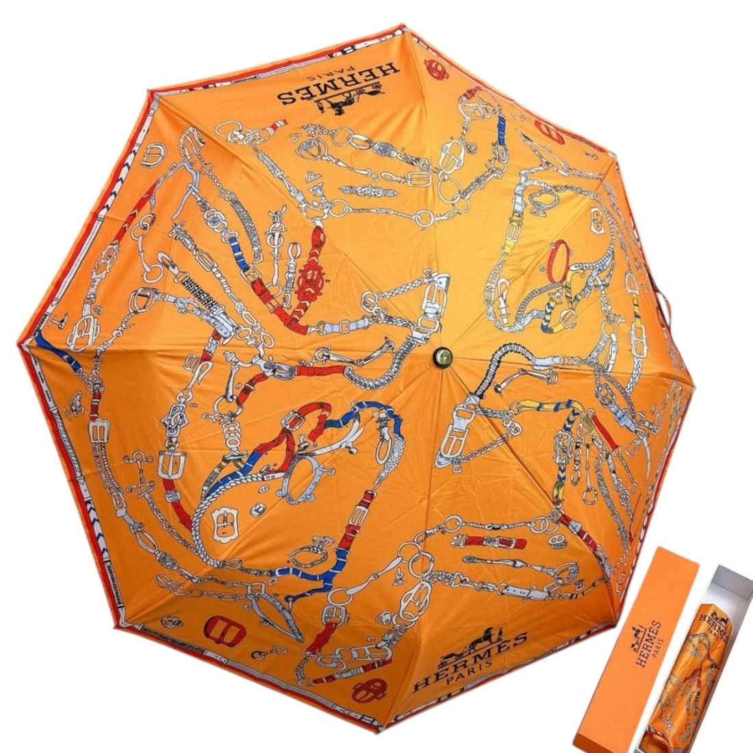 Hermes Signature Orange/Black & Silver Beaute Umbrella, Sleeve, & Original Box: • Hermes • Umbrella • Signature Orange • Black Accents • Silver Tone Hardware • Original Storage Sleeve Included • Original Box Included • Handle Loop For Easy 