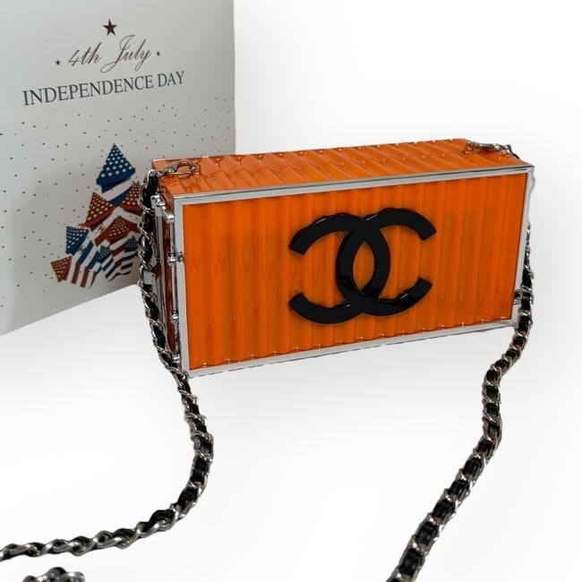 CHANEL Collector's Piece Orange/Black Acrylic Box Beaute Bag & Original Box: • CHANEL • Collector's Piece • Box Bags • Acrylic • Orange • Black Accents • Intertwined Leather Chain Strap • Removable Strap For Clutch Carry • Silver St