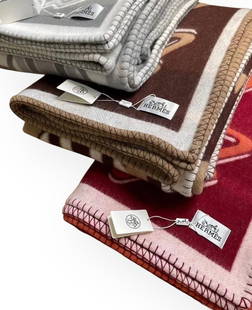 Hermes Red, Grey, Or Brown Tatersale Wool Blanket: • Hermes • Ithaque • Wool Blanket • White Accents • Signature Horse Logo • Wool/Polyester Fiber Mix • 70.1" x 55.1" (in) • 3 Color Choices: • A