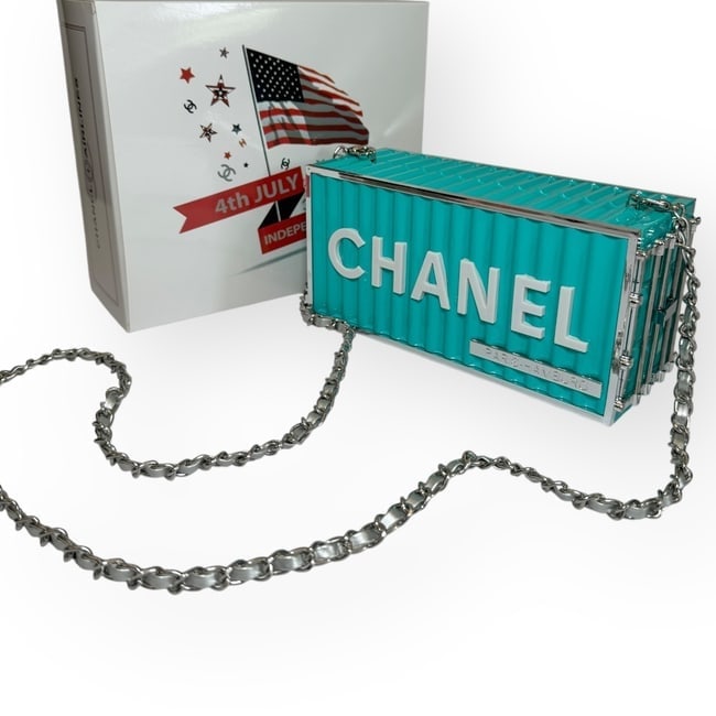 CHANEL Collector's Piece Turquoise/White Acrylic Box Clutch Box Beaute Bag & Original Box: • CHANEL • Collector's Piece • Box Bags • Acrylic • Turquoise • White Accents • Intertwined Leather Chain Strap • Removable Strap For Clutch Carry • Silver