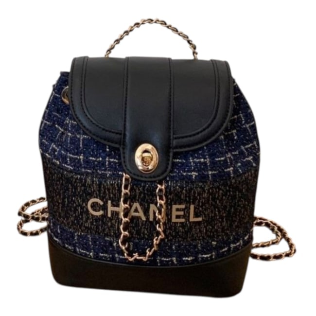 CHANEL Navy/Gold Tweed Front Logo Beaute Backpack: • CHANEL • Backpack • Navy • Gold Tone Hardware • Tweed Accents • Intertwined Leather Chain Strap • Top Handle For Optional Carry • Front Logo • Interior Z
