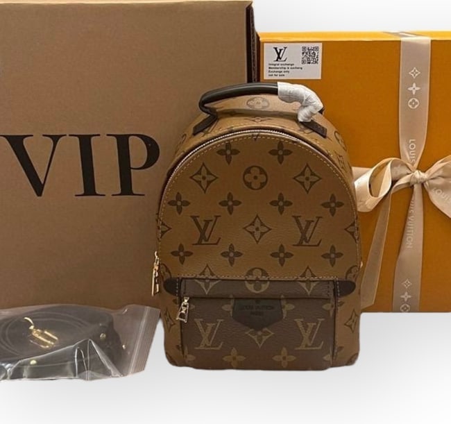 Louis Vuitton Reverse Monogram/Gold Mini Beaute Backpack & Original Box: • Louis Vuitton • Reverse Monogram • Mini Backpack • Gold Tone Hardware • Zip Closure • Top Handle Or Shoulder Carry • Removable Strap Included • Black Interior