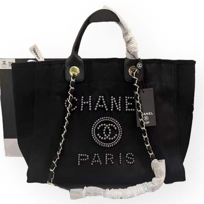 CHANEL LG Black Pearl Deauville Beaute Bag & Original Gift Bag: • CHANEL • Deauville • Tote • Black • Pearl Front Logo & Detail • Gold Tone Hardware • 15” x 12” x (in) • Double Handles • Shoulder Straps &bul