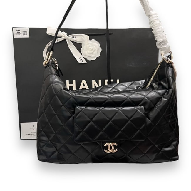 CHANEL LG Black/Red Hobo Beaute Bag & Original Gift Bag: • CHANEL • Black • Interior Color: Red • Maxi Hobo • Quilted Pattern • Gold Tone Hardware • Original Gift Bag Included • Zip Closure • Exterior Front Pocke