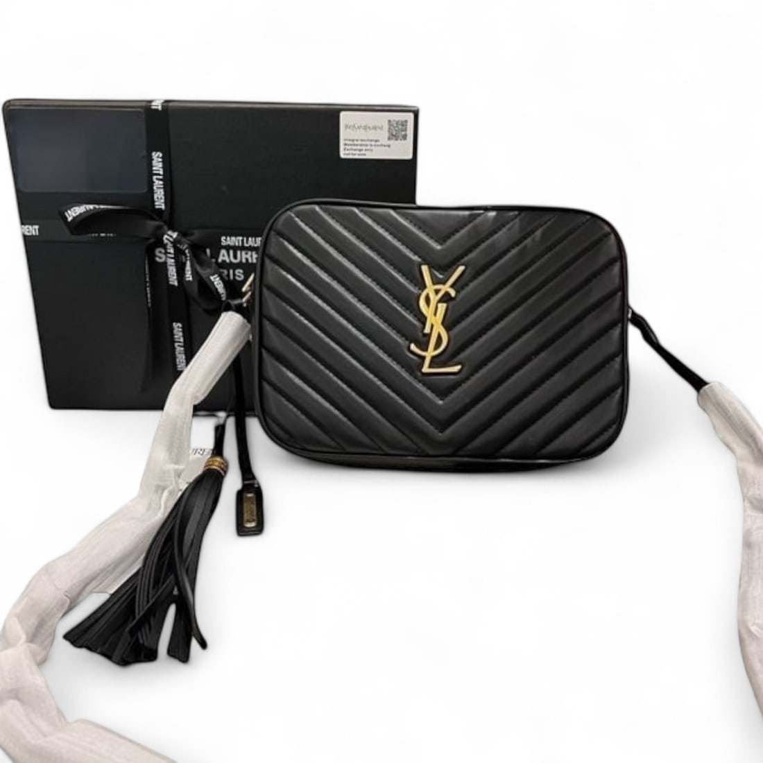 YSL (Saint Laurent) Black/Gold Chevron Camera Tassel Beaute Bag & Original Box: • YSL (Saint Laurent) • Camera Tassel Bag • Black • Chevron Print • Gold Tone Hardware • Zip Closure • Front Logo • Interior Slip Pocket • Original B