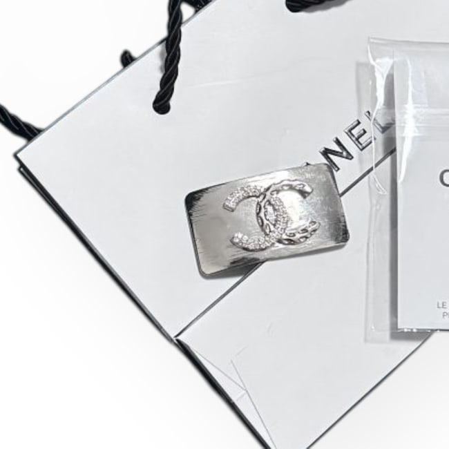 CHANEL Silver/Rhinestone Detailed CC Wide Rectangle Hair Clip: • CHANEL • L.A. Collection • Gabrielle • Hair Clip • White Rhinestone/Detailed CC Logo • Silver Tone Hardware • Wide Rectangle • Unopened/In Original Packaging