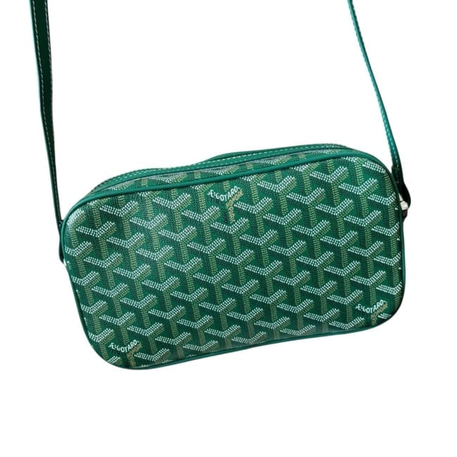 Goyard Green Signature Print Camera Beaute Bag & Original Gift Bag: • Goyard • Green • Camera Bag • Green • Signature Print • Exterior Slip Pocket • Silver Tone Hardware • Zip Closure • Front Logo • Interior Slip Pocke