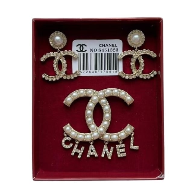 CHANEL 3Pc Set Pearl/Rhinestone Earring & Brooch Beaute Set & Original Box: • CHANEL • 3Pc Set • Gold Tone Hardware • Original Box Included • Earrings Included • Style: Drop • Rhinestone Covered CC With Top Pearl Detail • Brooch Include