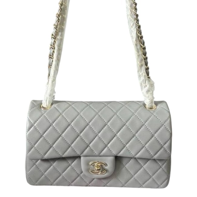 CHANEL Baby Grey/Gold Quilted Classic Flap Beaute Bag & Original Box: • CHANEL • Grey • Gold Tone Hardware • Classic Flap Bag • Quilted Pattern • Exterior Slip Pocket • Signature CC Turn Lock Closure • Intertwined Leather Chain St