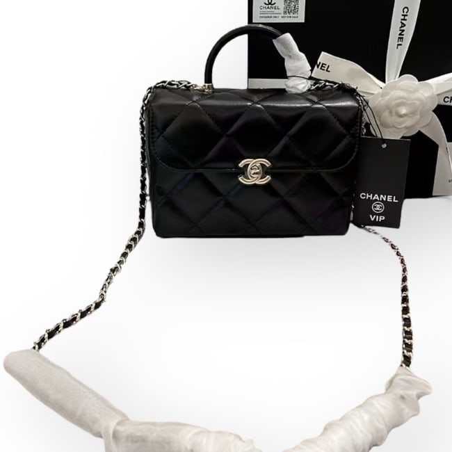 CHANEL Black Quilted Vanity Beaute Bag W/ Mirror & Original Box: • CHANEL • Black • Quilted Pattern • Silver Tone Hardware • Signature Front CC Twist Lock Closure • Internal Mirror • Top Handle Or Shoulder Carry • Interior Zi