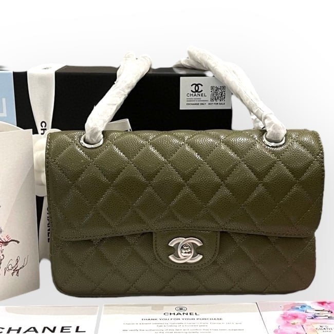 CHANEL Quilted Olive Green/Silver Double Flap Beaute Bag & Original Box: • CHANEL • Olive Green • Quilted Caviar Pattern • Double Flap Bag • 10” x 6” (in) • Silver Tone Hardware • Signature CC Twist Lock Closure • Interna