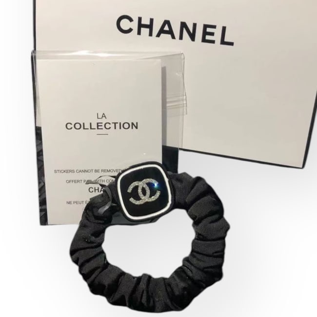 CHANEL Black/Rhinestone Logo Square Scrunchy & Gift Bag: • CHANEL • L.A. Collection • Gabrielle • Scrunchy/Hair Tie • Black • White Rhinestone CC Logo • White Trim • Black Scrunchy • Shape: Square &b