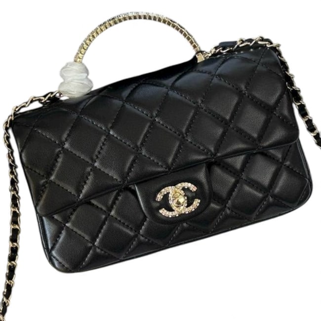 CHANEL Black Crystal Covered Top Handle/Wallet On Chain Beaute Bag & Original Box: • CHANEL • Black • Crystal Accented Beveled CC • Quilted Pattern • Internal Zip Pockets • Top Handle WOC • Top Handle or Shoulder Carry • Silver Tone Hardware <