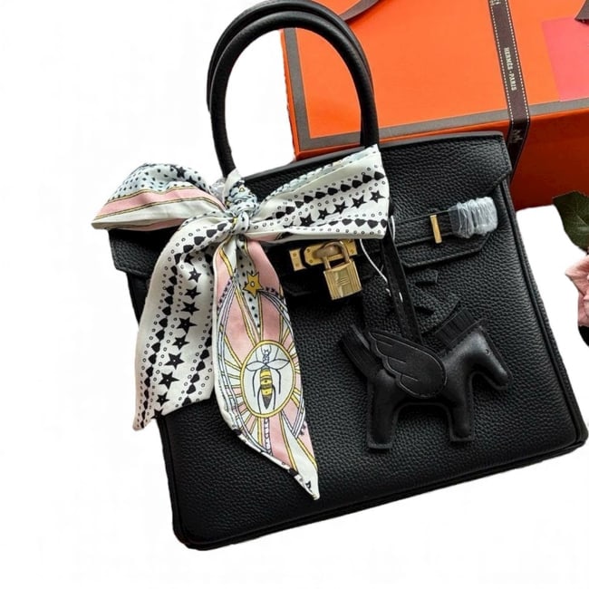 Hermes Black/Gold Birkin 30 Beaute Bag & Original Box: • Hermes • Black • Gold Tone Hardware • Birkin Bag 30 • Signature Twist Lock Closure • Double Handles • Interior Slip Pocket • Lock/Key Included • Pr