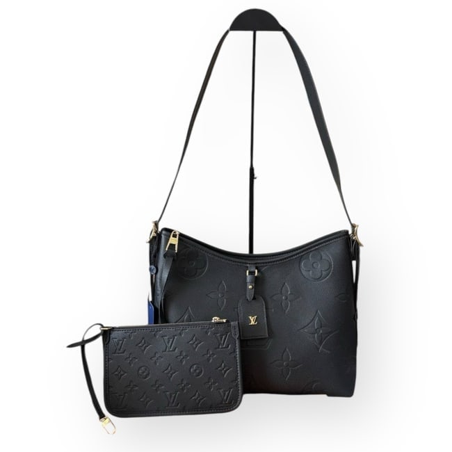 Louis Vuitton Black/Black Monogram Carryall Beaute Bag & Original Gift Bag: • Louis Vuitton • Black • Black Accents • Monogram Pattern • Carryall • Gold Tone Hardware • Adjustable Strap • Zip Closure • Interior Zip Pocket <b