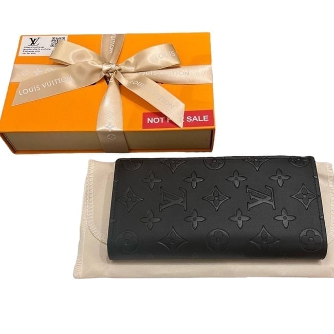 Louis Vuitton Black Monogram Classic Long Fold Beaute Wallet & Original Box: • Louis Vuitton • Type: Wallet • Style: Classic Long Fold • Color: Black • Pattern: Monogram Pattern • Hardware: Silver Tone • Features: Card Slots, Cash Compartment