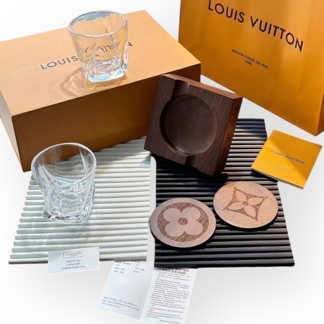 5Pc Custom Louis Vuitton Glass/Monogram Coaster Set & Original Box: • Custom Louis Vuitton Glass & Coaster Set • 5 Piece Set: • 2 Glasses Included • 2 Wood Monogram Engraved Coasters Included • 1 Wood Monogram Engraved Coaster Holder Included