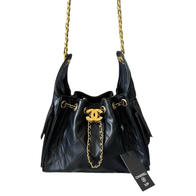 CHANEL Black Quilted Hobo Bucket Bag & Original Gift Bag: • CHANEL • Hobo Bucket Bag • Black • Gold Tone Hardware • Quilted Pattern • Chunky Intertwined Leather Chain Strap • Interior Slip Pocket • Interior Zip Pocket