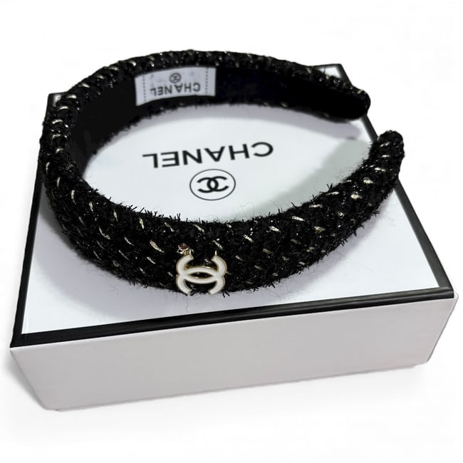 CHANEL Black/Gold Tweed CC Logo Beaute Headband & Original Box: • CHANEL • Headband • Black • Tweed Material • Gold Accents ." White CC Logo • Gold Trim Around Logo • O/S • Original Box Included • Makeup/Diffusion Line:
