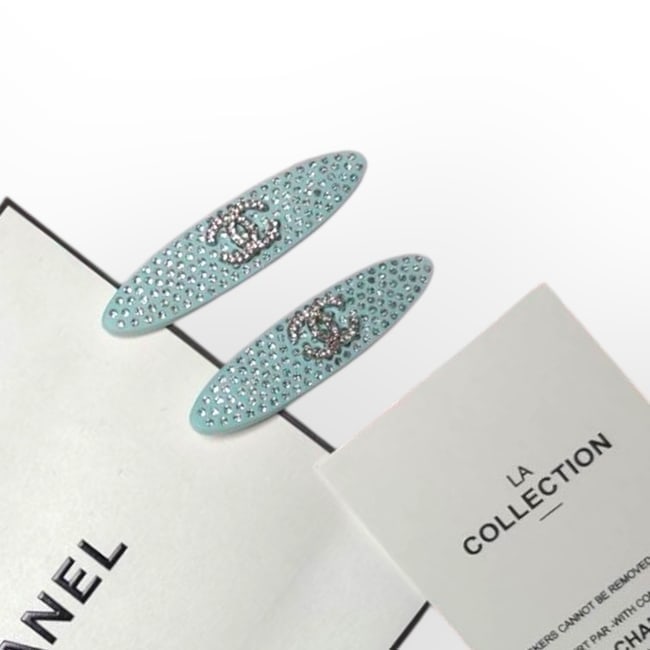 CHANEL 2Pc Lg Blue/Rhinestoned Long Oval Hair Clips & Gift Bag: • CHANEL • Gabrielle • L.A. Collection • Hair Clips • 2Pc Set • Blue • Rhinestone CC Logo • Rhinestone Accents • Shape: Long Oval • Size: