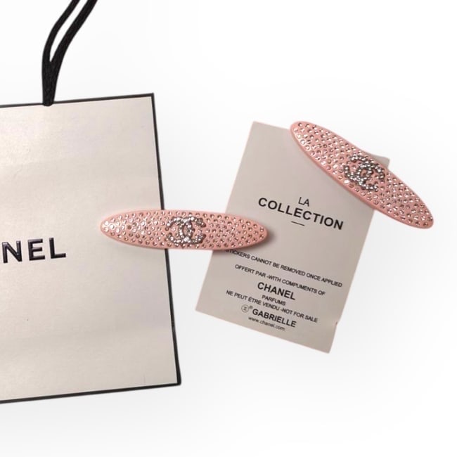 CHANEL 2Pc Coral/Rhinestoned Long Oval Hair Clips & Gift Bag: • CHANEL • Gabrielle • Hair Clips • 2Pc Set • Coral Pink • Rhinestone CC Logo • Rhinestone Accents • Shape: Lg Long Oval • L.A Collection &bul