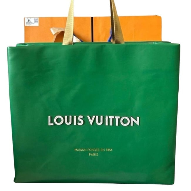 Louis Vuitton XL Green/White Canvas Shopping Beaute Tote: • Louis Vuitton • XL Shopping Tote • Green • White Accents • Double Handles • Front Logo • Hook Closure • Interior Zip Pocket • Interior Slip Pocket <