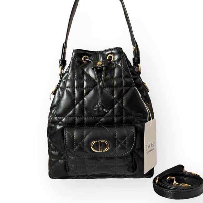 Christian DIOR Black/Gold Drawstring Beaute Bag & Original Box: • Christian DIOR • Drawstring Bag • Black • Gold Tone Hardware • Removable Shoulder Strap Included • Front Snap Pocket • Drawstring Closure • Front Logo &