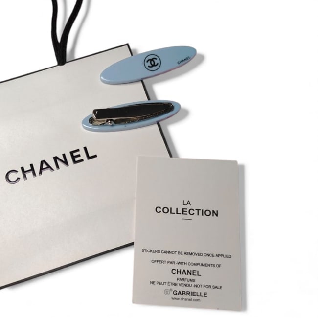 CHANEL 2Pc Baby Blue/Black CC Long Oval Beaute Hair Clips & Original Gift Bag: • CHANEL • 2Pc Set • Gabrielle • Hair Clips • Baby Blue • Black Accents • CC Logo • Silver Tone Hardware • Shape: Lg Long Oval • L.A Collection &bu