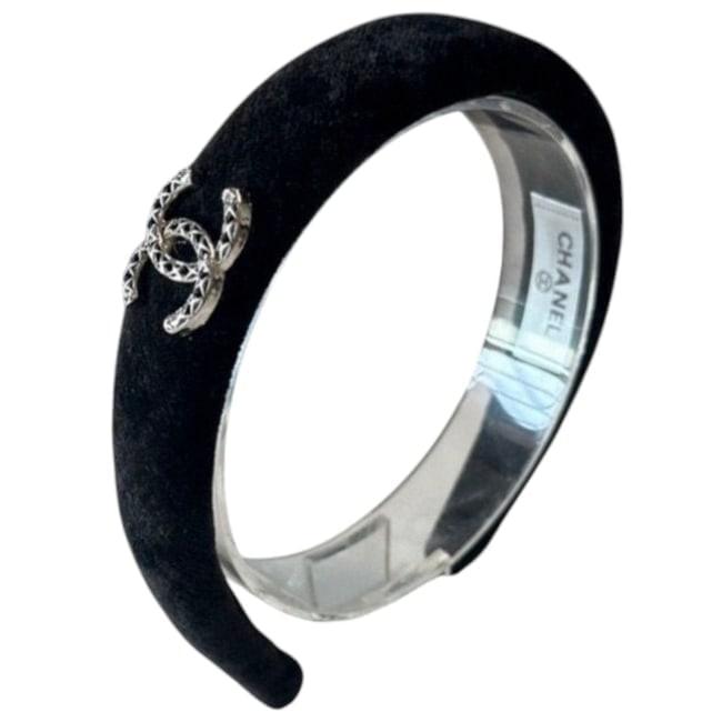 CHANEL Black & Silver Logo Beaute Headband: • CHANEL • Headband • Black • Side Logo • Silver Tone Hardware • O/S • Makeup/Diffusion Line: Please note that gwp/beaute items are not sold in boutique stores & som
