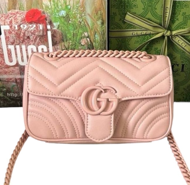 Gucci Pink On Pink GG Marmont Beaute Bag & Original Box: • Gucci • GG Marmont • Pink • Pink Accents • Pink Tone Hardware • Shoulder Carry • Front Logo • Interior Slip Pocket • Magnetic Closure •