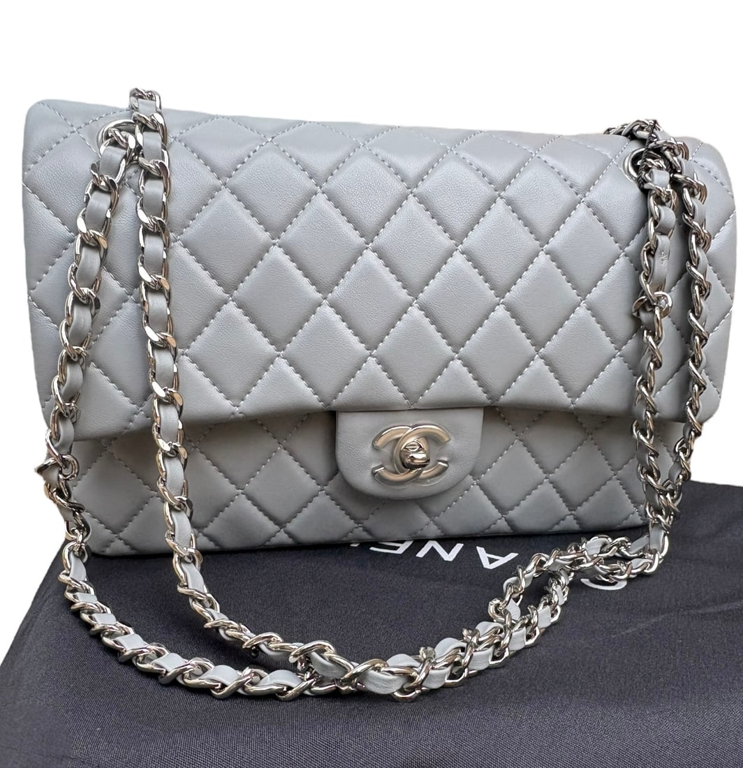 CHANEL Baby Grey/Gold Quilted Classic Flap Beaute Bag & Original Box: • CHANEL • Grey • Gold Tone Hardware • Classic Flap Bag • Quilted Pattern • Exterior Slip Pocket • Signature CC Turn Lock Closure • Intertwined Leather Chain St