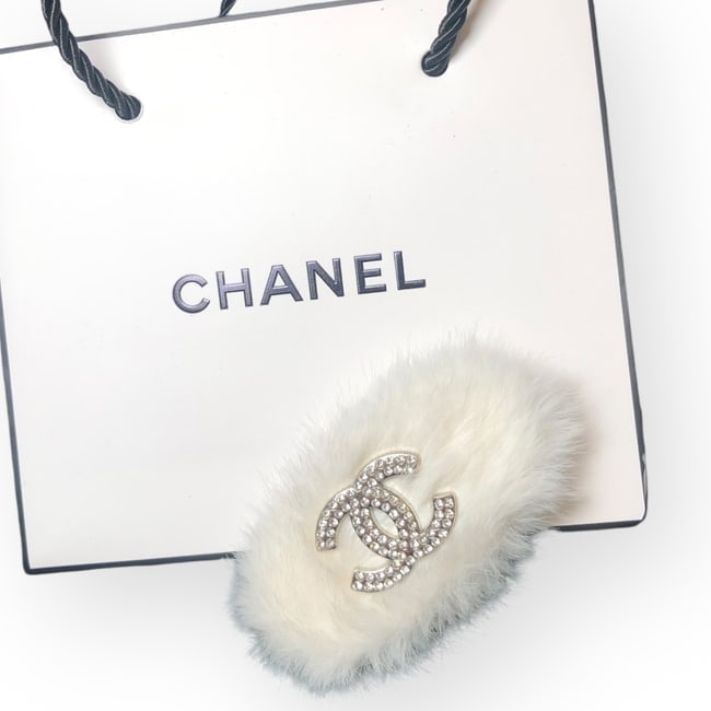 CHANEL White Fur/Silver & White Rhinestone CC Oval Hair Clip & Gift Bag: • CHANEL • Gabrielle • Hair Clip • White Fur • Silver CC W/ White Rhinestone Detail • L.A Collection • Unopened/In Original Packaging • Original Gift Bag Includ