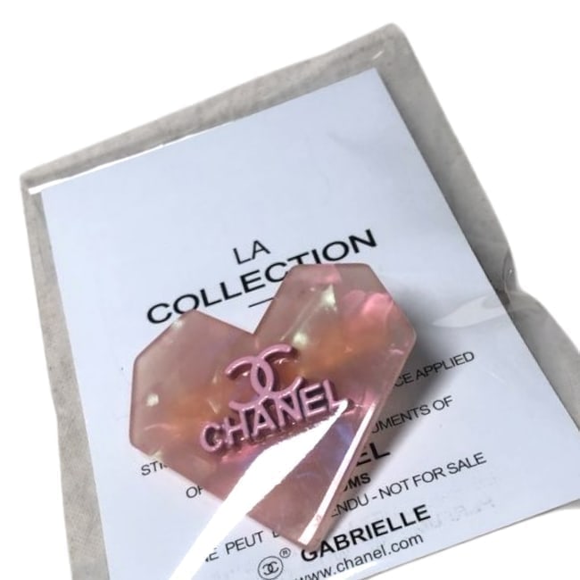 CHANEL Pink Crystal/Pink CC Logo Heart Hair Clip & Gift Bag: • CHANEL • Gabrielle • Hair Clip • Pink Crystal • Pink CC Logo • Shaped: Heart • Gold Tone Hardware • L.A Collection • Unopened/In Original Packaging &b