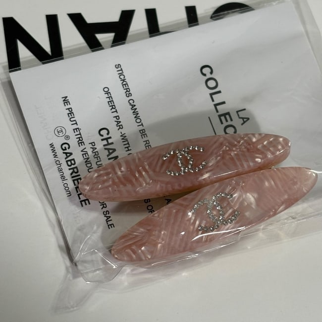 CHANEL 2Pc Pink Shimmer/Rhinestone CC Long Oval Beaute Hair Clips & Original Gift Bag: • CHANEL • 2Pc Set • Gabrielle • Hair Clips • Pink Shimmer • Rhinestone CC • Silver Tone Hardware • Shape: Lg Long Oval • L.A Collection • Original Gi