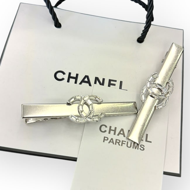 CHANEL 2Pc Set Silver/Crystal Covered CC Long Rectangle Hair Clips: • CHANEL • 2Pc Set • Gabrielle • Hair Clips • Shape: Long Rectangle • White Crystals CC Logo • Silver Tone Hardware • L.A Collection • Unopened/In Original