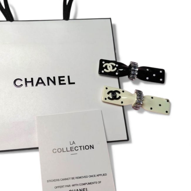 CHANEL 2Pc Lg White/Black Rhinestone Detail Beaute Hair Clips & Gift Bag: • CHANEL • 2Pc Set • Gabrielle • Hair Clips • White & Black • Rhinestone Accents • Polka Dot Detail • CC Logo • Silver Tone Hardware • Shape: Bow &bul