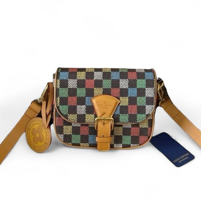 Louis Vuitton Damier Ebene Montsouris Messenger Beaute Bag: • Louis Vuitton • Montsouris Messenger • Damier Ebene Pattern • Multicolor • Gold Tone Hardware • Front Buckle Closure • Interior Slip Pocket • Removable Strap
