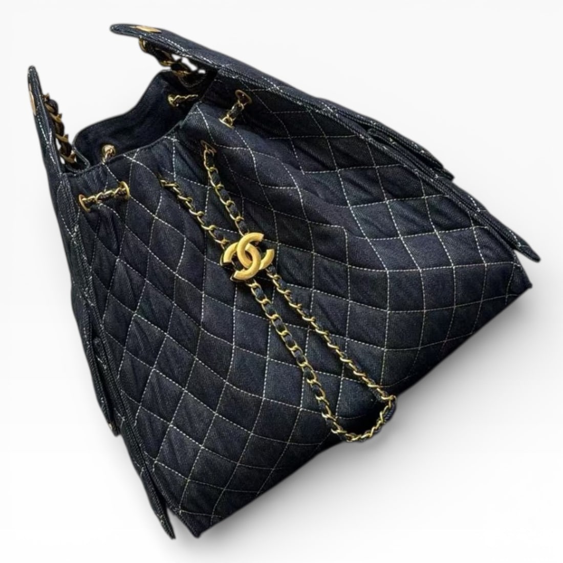 CHANEL Quilted Dark Denim/Gold Top Handle Hobo Beaute Bag & Original Gift Bag: • CHANEL • Dark Denim • Quilted Pattern • Gold Tone Hardware • Top Handle • Hobo • Intertwined Leather Chain Strap • Drawstring Closure • Interior Zip Pock