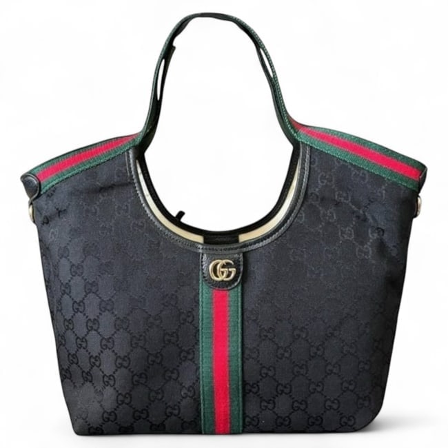 Gucci Black Signature Print Giglio Beaute Tote & Removable Pouch & Gift Bag: • Gucci • Giglio • Black • Tote • Signature Print • Double Handles • Removable Shoulder Strap Included • Removable Pouch Included • Gold Tone Hardware