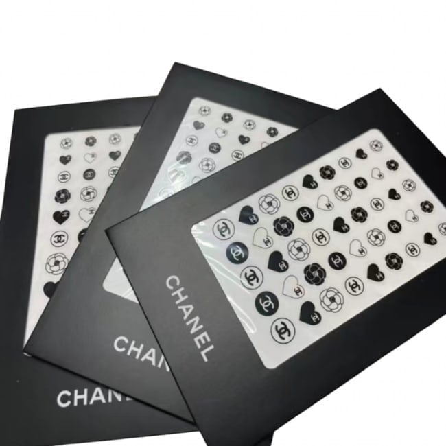 CHANEL 3Pc Black Transparent Nail Art Sticker Set: • CHANEL • 3 Packs Included (3 Sheets Total) • Black • Transparent Assorted Nail Art Stickers