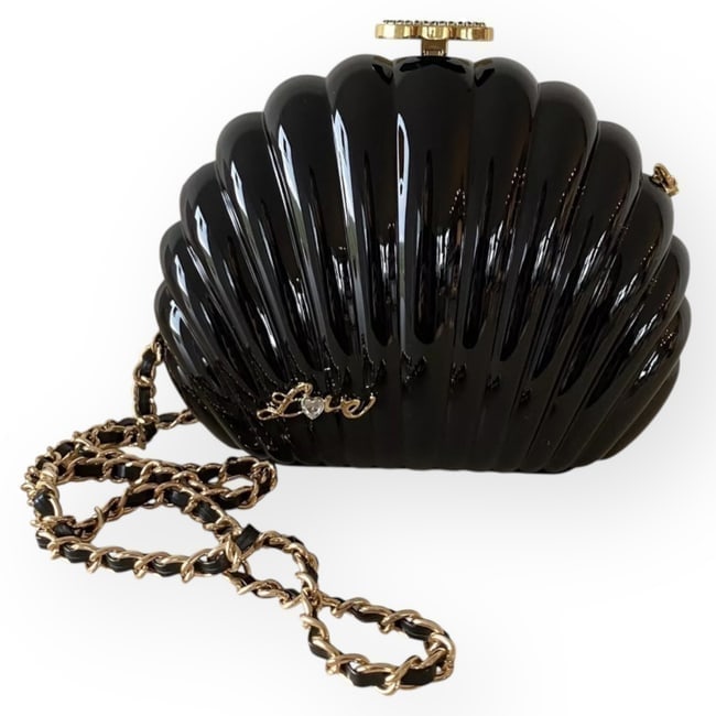 CHANEL Limited Ed Rhinestone Logo Airline Collection Shell Clutch Beaute Bag & Box: • Chanel • Collectors Piece • Black • Gold Tone Hardware • Front Gold Tone Rhinestone Love Detail • Black Rhinestone CC Logo • Limited Edition Airline Collection &bu