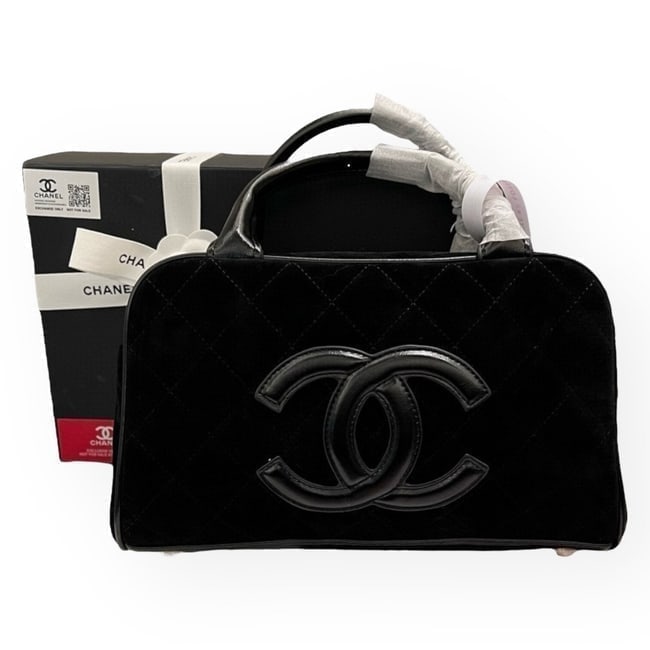CHANEL Quilted Black On Black Front Logo Bowler Top Handle Beaute Bag: • CHANEL • Color: Black • Pattern: Quilted • Style: Bowler Bag • Hardware: Gold Tone • Accents: Black Accents • Handles: Double Handles • Carry Style: Top Handl