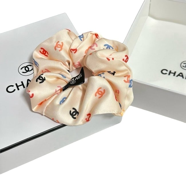 CHANEL Beige/Multicolor Logo Beaute Hair Scrunchy & Original Gift Bag: • CHANEL • Hair Scrunchy/Tie • Beige • Multicolor CC Logo • Original Gift Bag Included