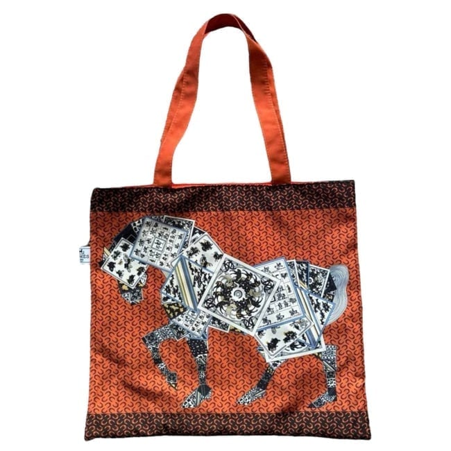 Hermes Orange Multicolor Signature Horse Print U.L Tote: • Hermes • Type: Tote • Color: Orange Multicolor • Pattern: Signature Horse Print • Interior: Signature Orange Interior • Material: Canvas • Handles: Double Handles