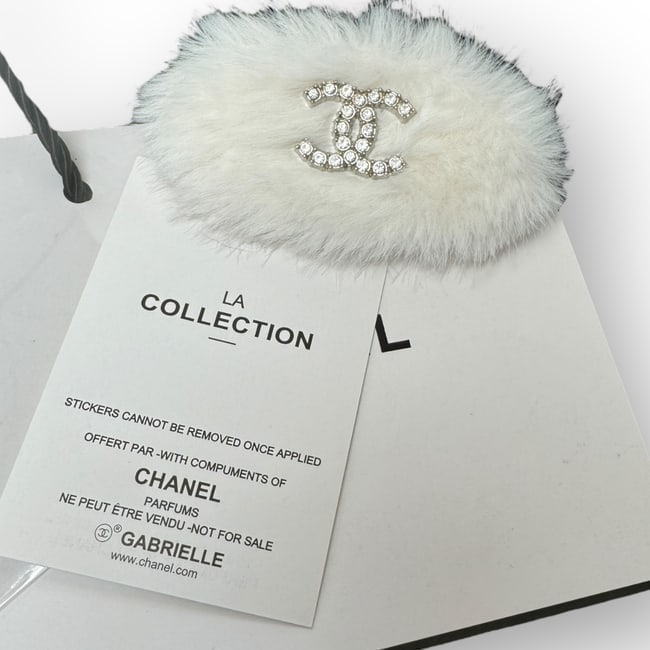 CHANEL White Fur/Rhinestone CC Hair Clip & Original Gift Bag: • CHANEL • Gabrielle • Hair Clip • White Fur • White Rhinestone CC • Silver Trim • L.A Collection • Original Gift Bag Included