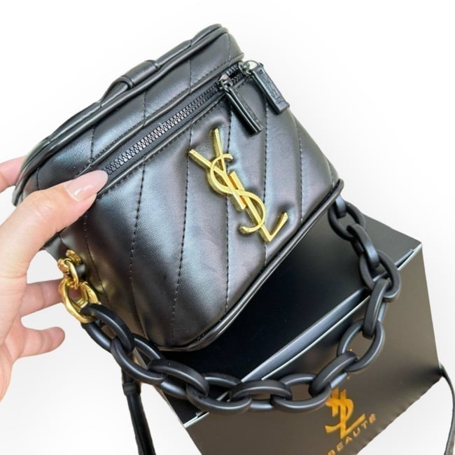 YSL (Saint Laurent) Black/Gold Vanity Beaute Case W/ Mirror On Chain & Box: • YSL (Saint Laurent) • Type: Vanity Case • Color: Black • Hardware: Gold Tone • Feature: Internal Mirror • Handle: Chain Link Top Handle • Strap: Adjustable/Removab