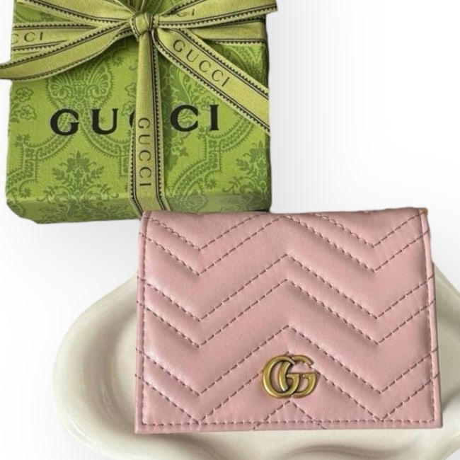 Gucci Pink/Gold Marmont Front Logo Beaute Wallet & Original Box: • Gucci • Wallet/Card Holder • Pink • Gold Tone Hardware • Marmont • Front Logo • Snap Closure • Card Slots • Cash Slot • Original Box Included <