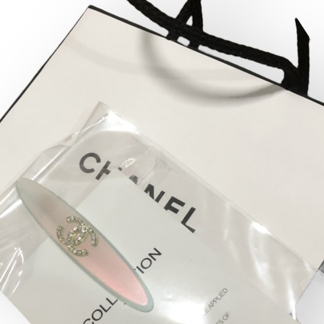 CHANEL Iridescent Rhinestone CC Long Oval Hair Clip & Gift Bag: • CHANEL • Collection: L.A. Collection • Style: Gabrielle • Type: Hair Clips • Finish: Iridescent • Detail: White Rhinestone Detail • Shape: Long Oval • Size: L