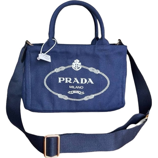 Prada Blue/White 2Way Carry Beaute Tote & Original Box: • Prada • Blue • White Accents • Tote • Shoulder Carry • Top Handle Carry Optional • Double Handles • Front Logo • Zip Closure • Interior Zip Pock