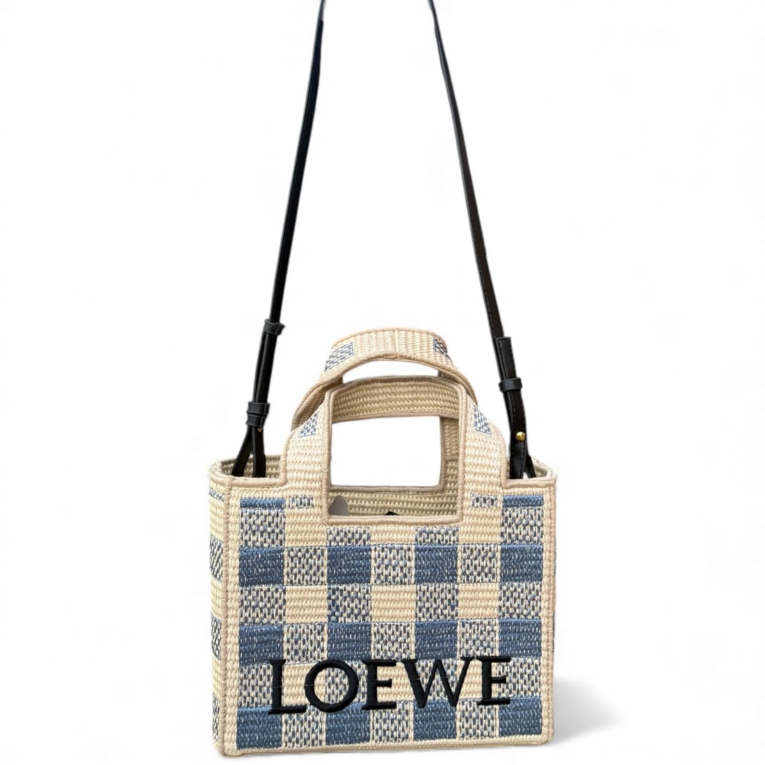 Loewe Woven/Blue Front Logo 2Way Carry Beaute Tote: • Loewe • Tote • Woven • Blue Accents • Double Handles • Front Logo • Gold Tone Hardware • Interior Zip Pocket • Interior Slip Pocket • R